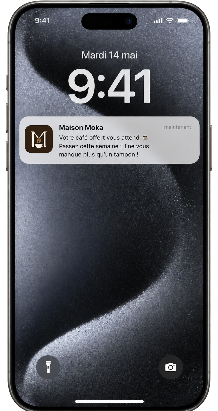 Écran verrouillé d'un iPhone affichant une notification de carte de fidélité Fideleo : « Votre café offert vous attend, il ne vous manque plus qu'un tampon »
